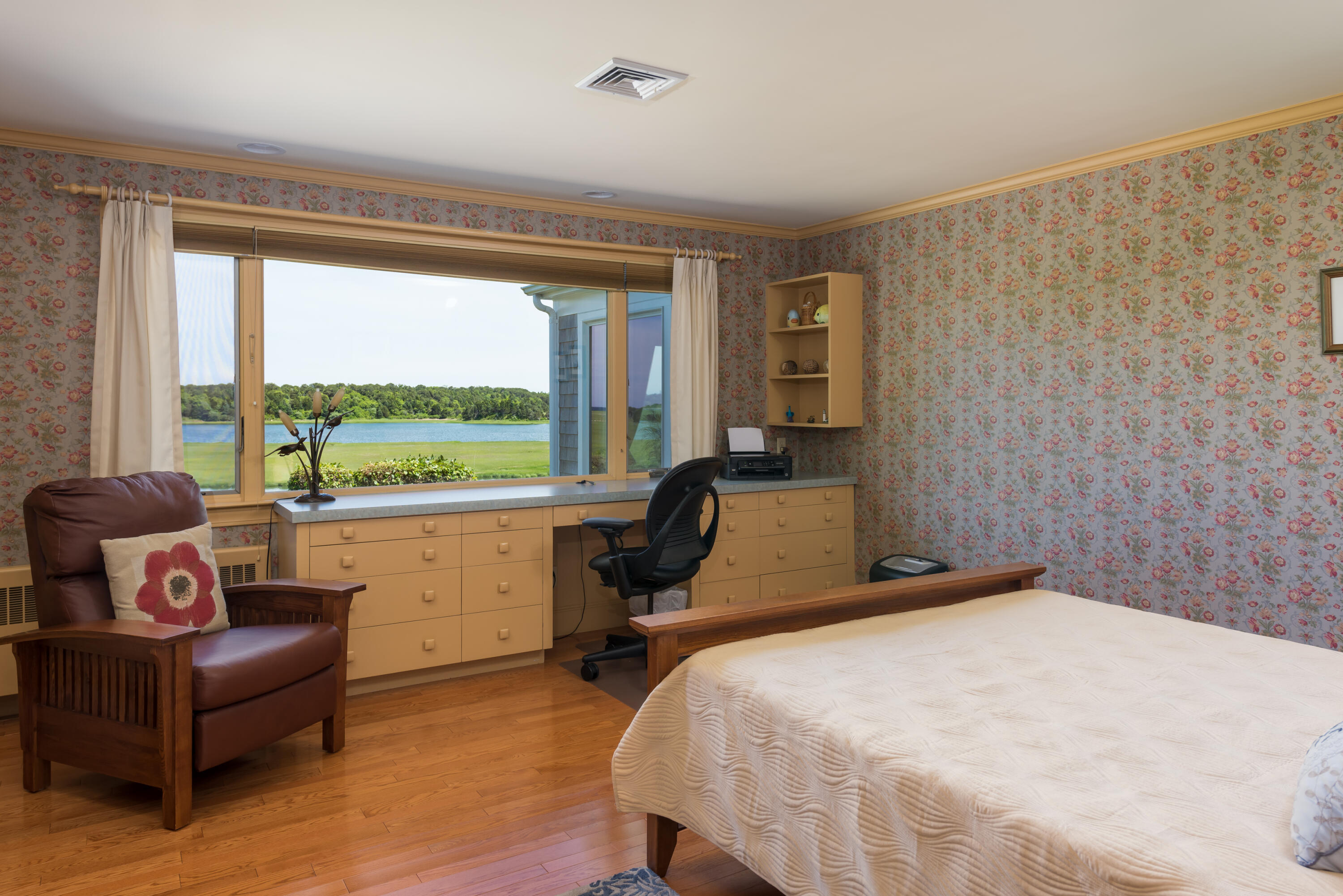 71 Briar Spring Road Orleans, MA 02653 - Photo 36 of 45 a bedroom with a bed and a couch