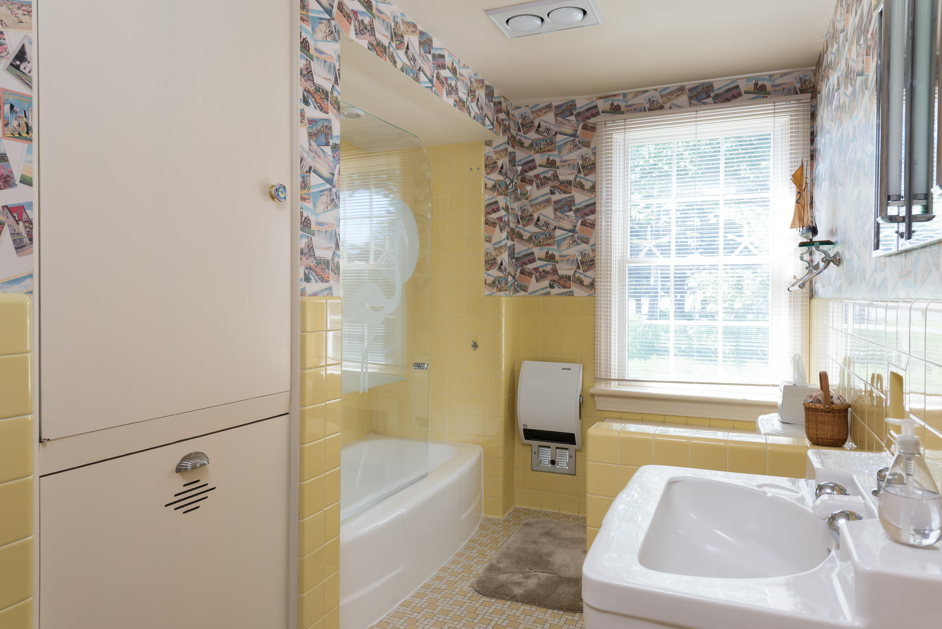 71 Briar Spring Road Orleans, MA 02653 - Photo 38 of 45 a bathroom with a tub a sink and a window