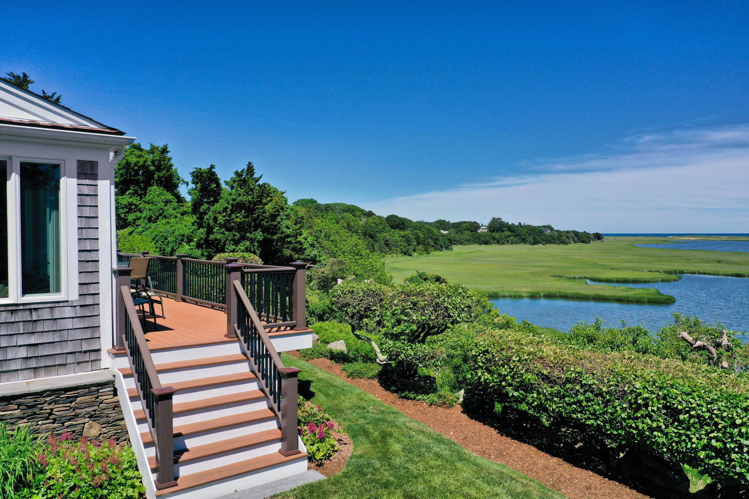 71 Briar Spring Road Orleans, MA 02653 - Photo 4 of 45 a front view of a house with a yard