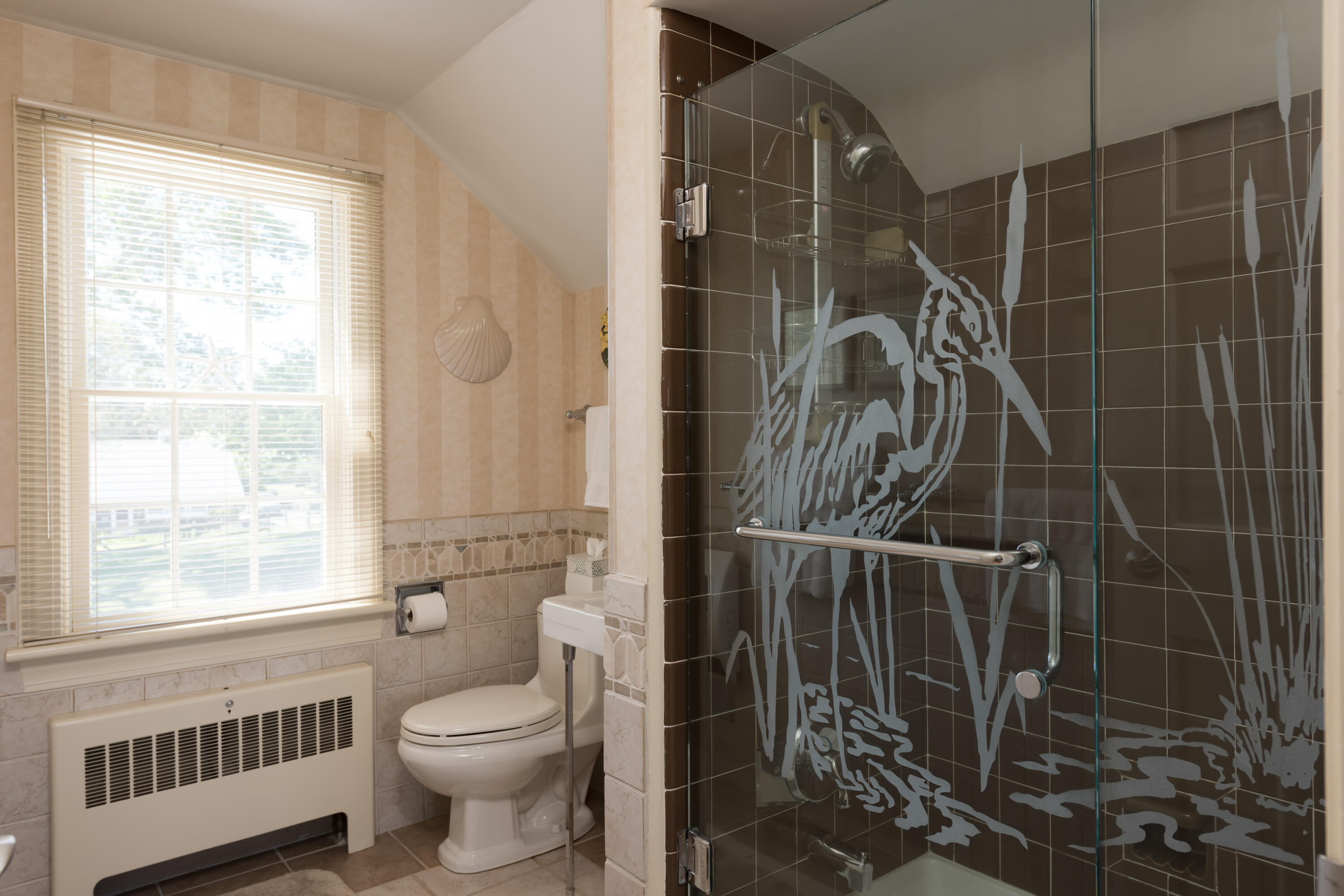 71 Briar Spring Road Orleans, MA 02653 - Photo 42 of 45 a bathroom with a toilet and a shower