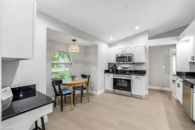 a kitchen with sink cabinets and counter space