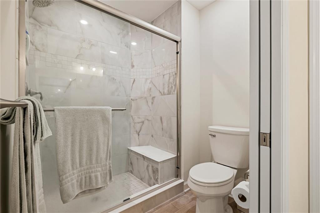 1254 Sandy Rdg Drive Sarver, PA 16055 - Photo 17 of 24 a bathroom with a granite countertop toilet a sink and a mirror