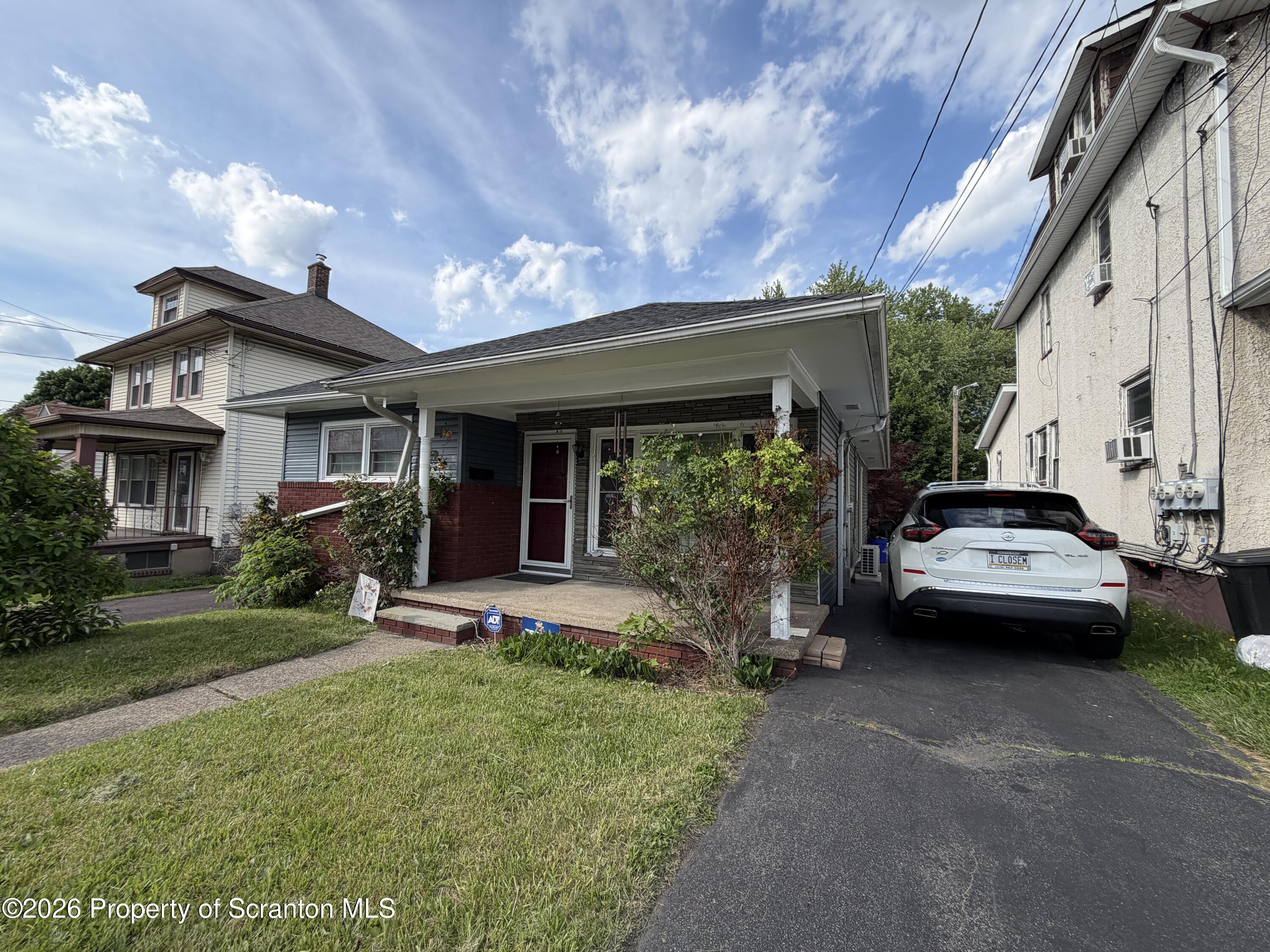 1019 Moosic Street Scranton, PA 18505 - Photo 1 of 43 a view of house with a yard