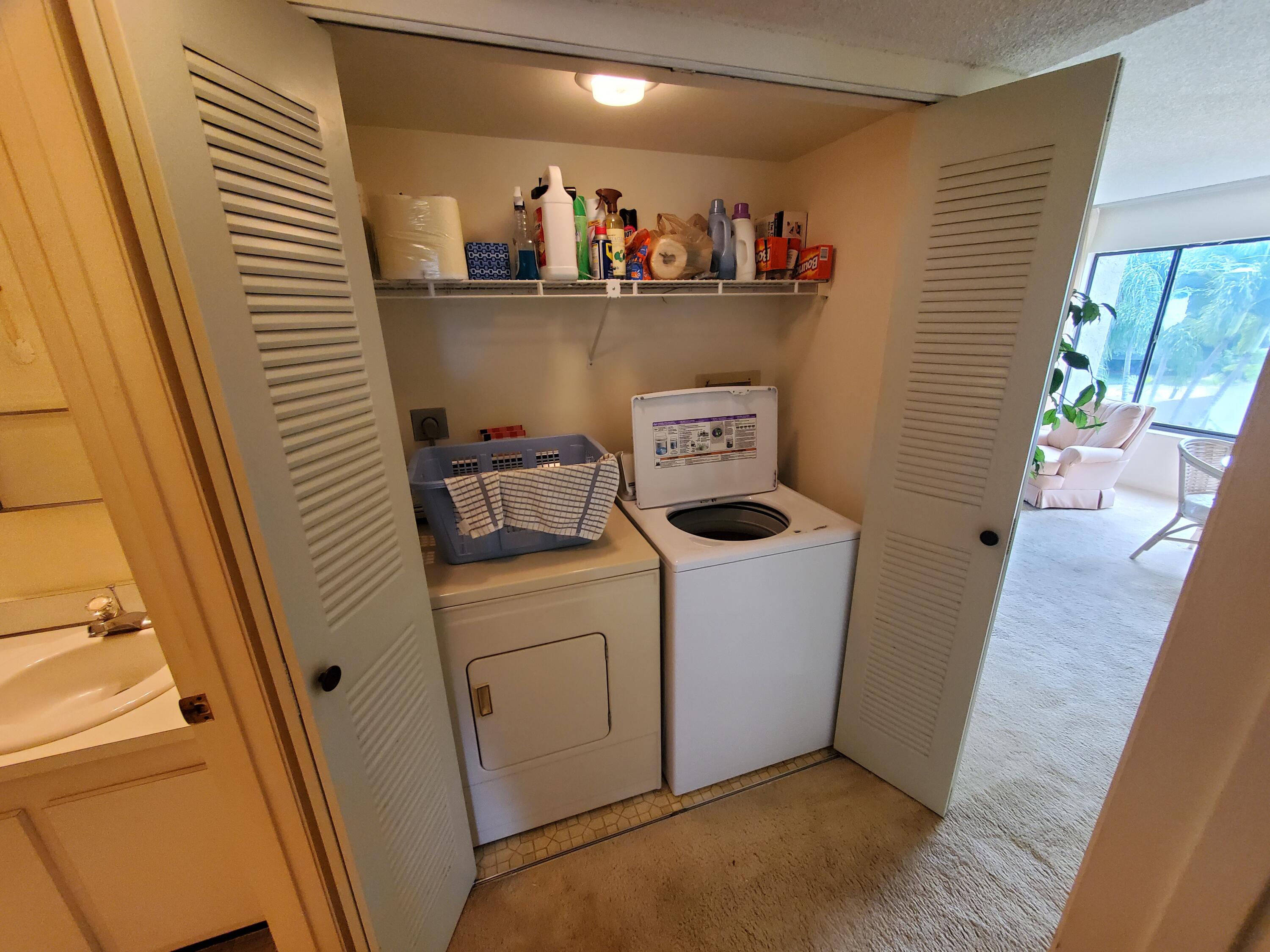 1600 Northeast Dixie Highway, Unit 9206 Jensen Beach, FL 34957 - Photo 15 of 33 Laundry Closet