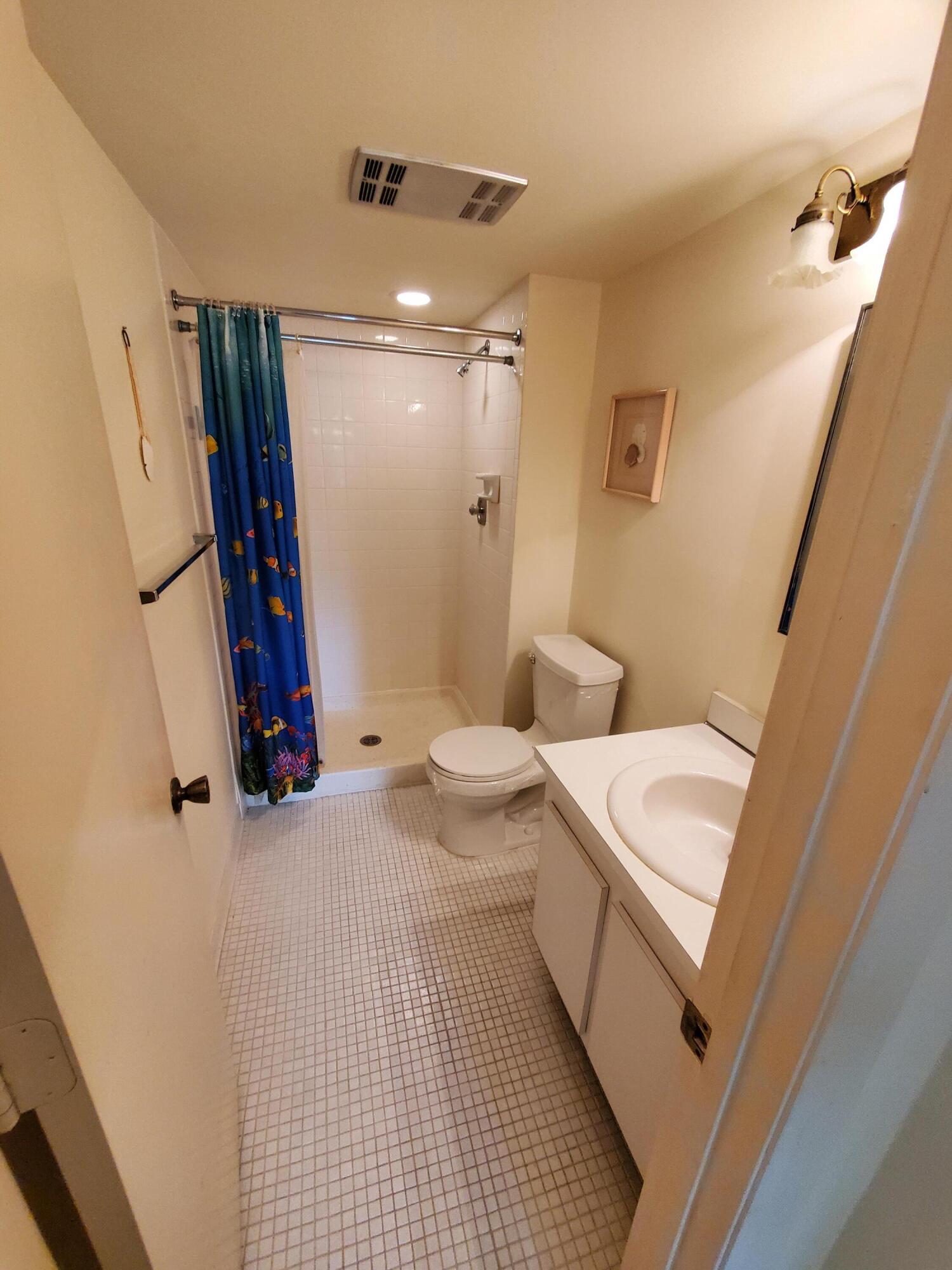 1600 Northeast Dixie Highway, Unit 9206 Jensen Beach, FL 34957 - Photo 18 of 33 Guest Bathroom with Shower
