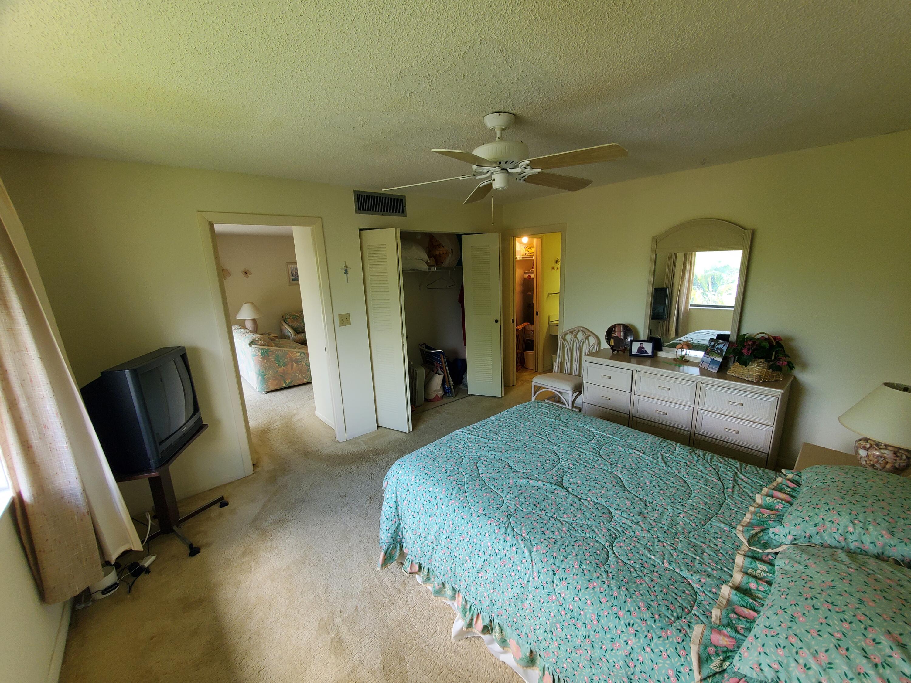 1600 Northeast Dixie Highway, Unit 9206 Jensen Beach, FL 34957 - Photo 20 of 33 Main Bedroom with closet and attached Ba