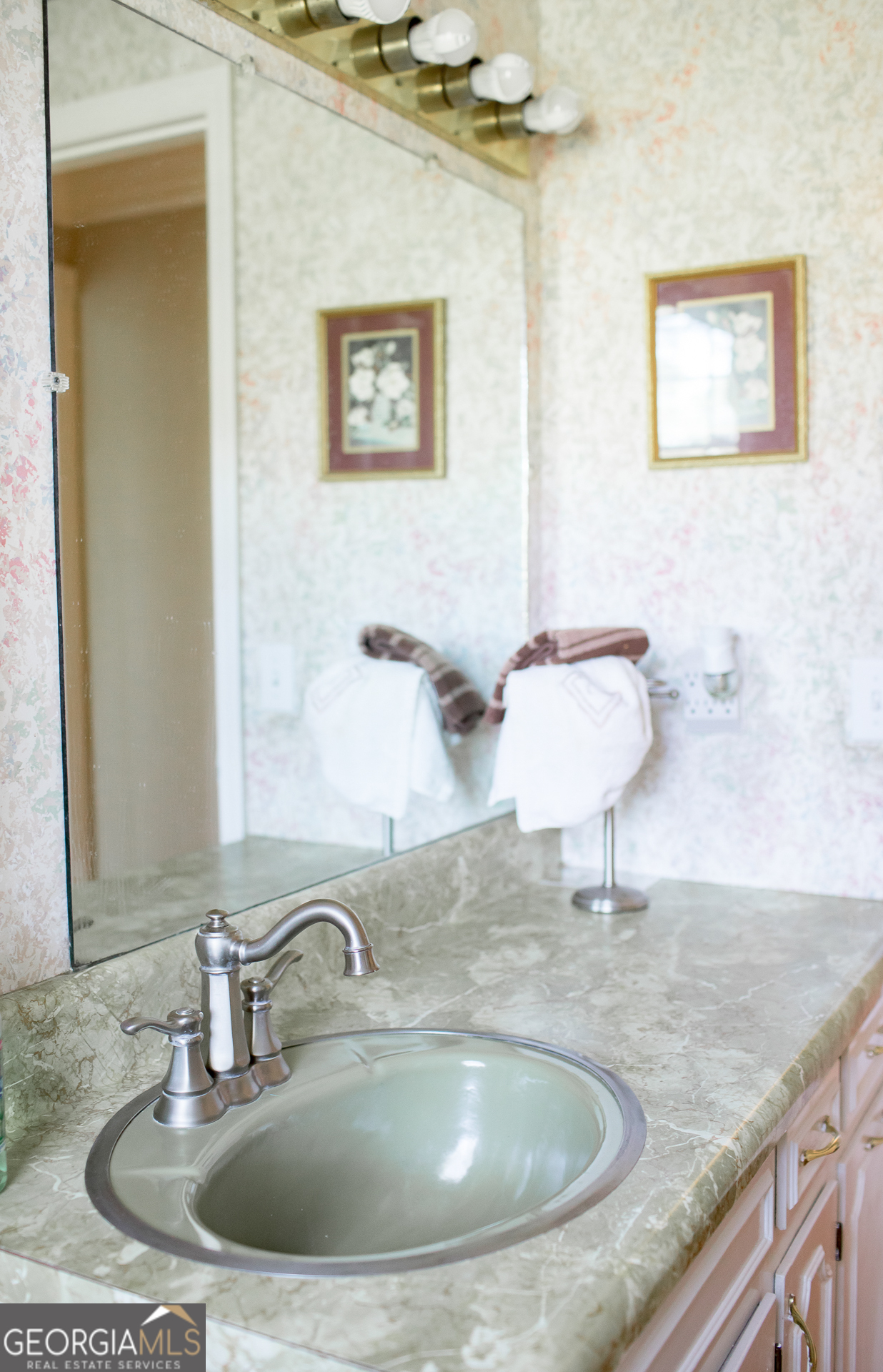 2110 Ware Street Blackshear, GA 31516 - Photo 42 of 57 a bathroom with a granite countertop sink