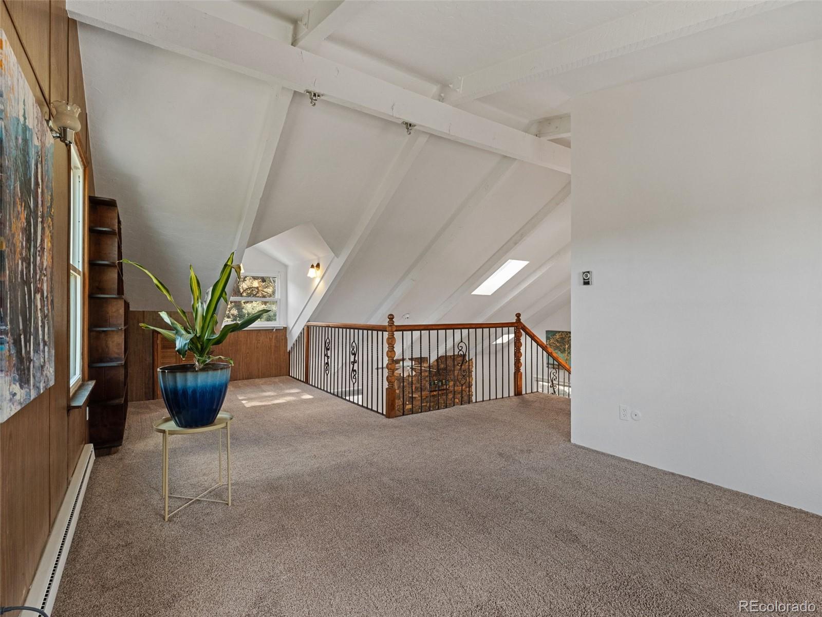 11825 South Little Turtle Lane Conifer, CO 80433 - Photo 21 of 34 a view of entryway and livingroom