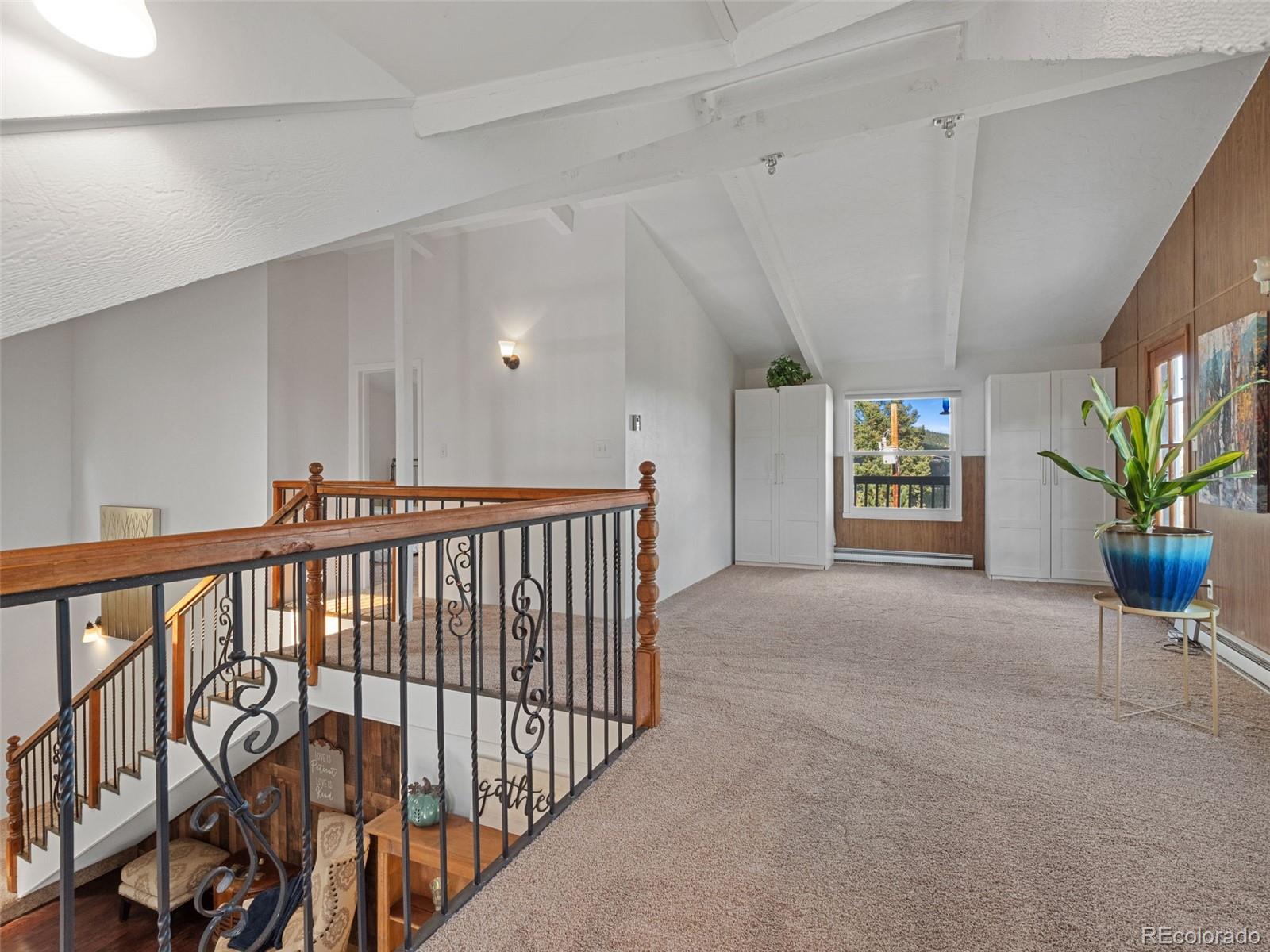 11825 South Little Turtle Lane Conifer, CO 80433 - Photo 22 of 34 a view of an entryway with a flower pot