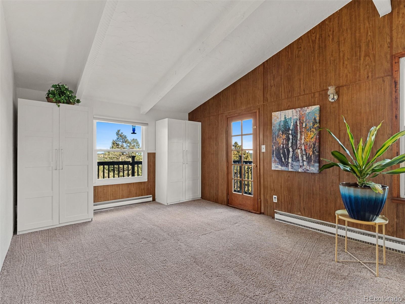 11825 South Little Turtle Lane Conifer, CO 80433 - Photo 24 of 34 a view of an empty room with a window