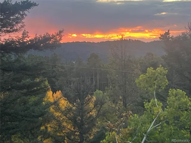 a view of a lake with a mountain in the background