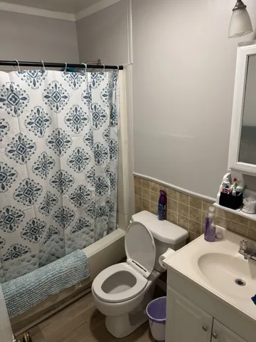 a kitchen with a stove and a refrigerator