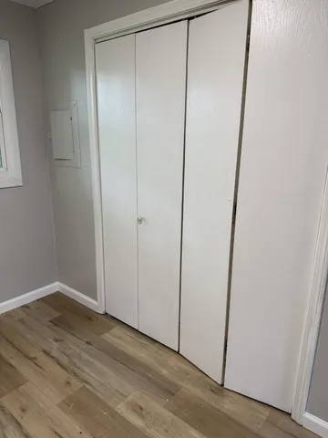 a view of entryway with wooden floor