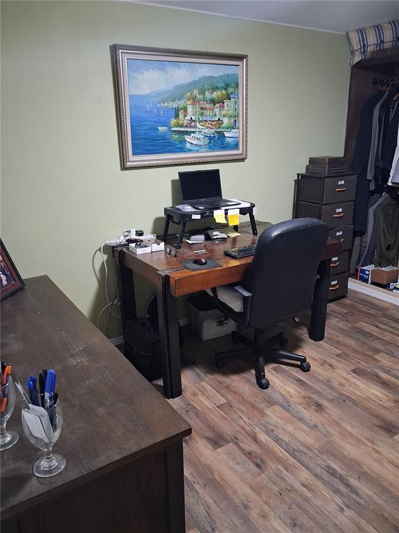 10360 County Road 18 Lake Butler, FL 32054 - Photo 11 of 43 a view of a workspace with furniture and wooden floor
