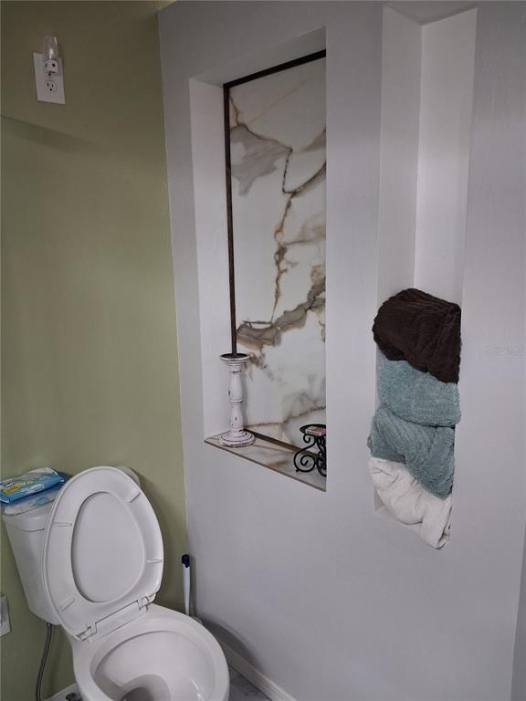 10360 County Road 18 Lake Butler, FL 32054 - Photo 15 of 43 a bathroom with a toilet and a sink