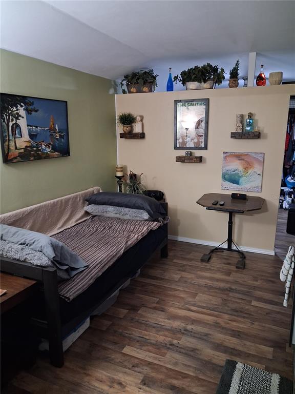 10360 County Road 18 Lake Butler, FL 32054 - Photo 19 of 43 a bedroom with a bed and wall painting on the wall