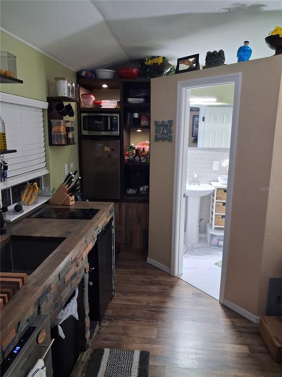 10360 County Road 18 Lake Butler, FL 32054 - Photo 24 of 43 a kitchen with stainless steel appliances granite countertop a refrigerator and a sink