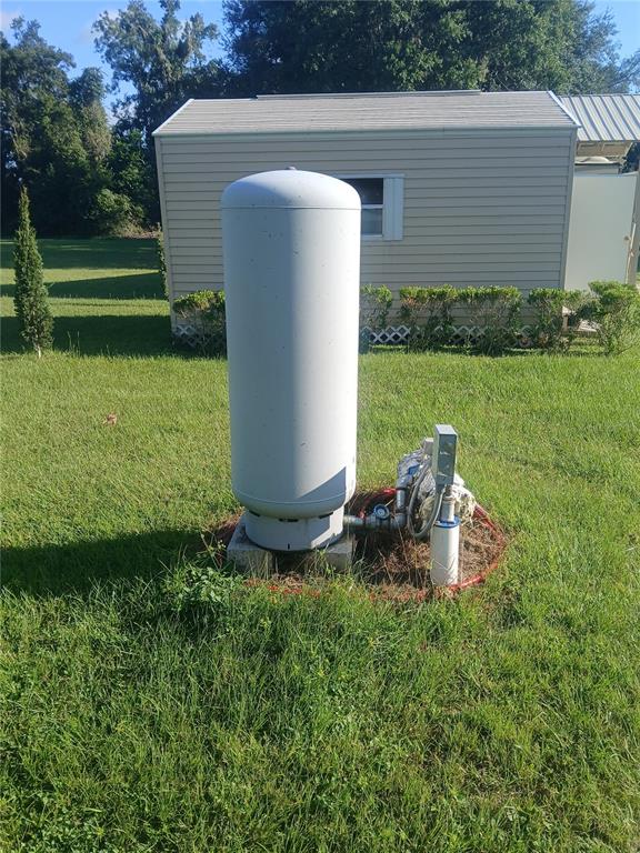 10360 County Road 18 Lake Butler, FL 32054 - Photo 3 of 43 a view of a backyard with plants and garden