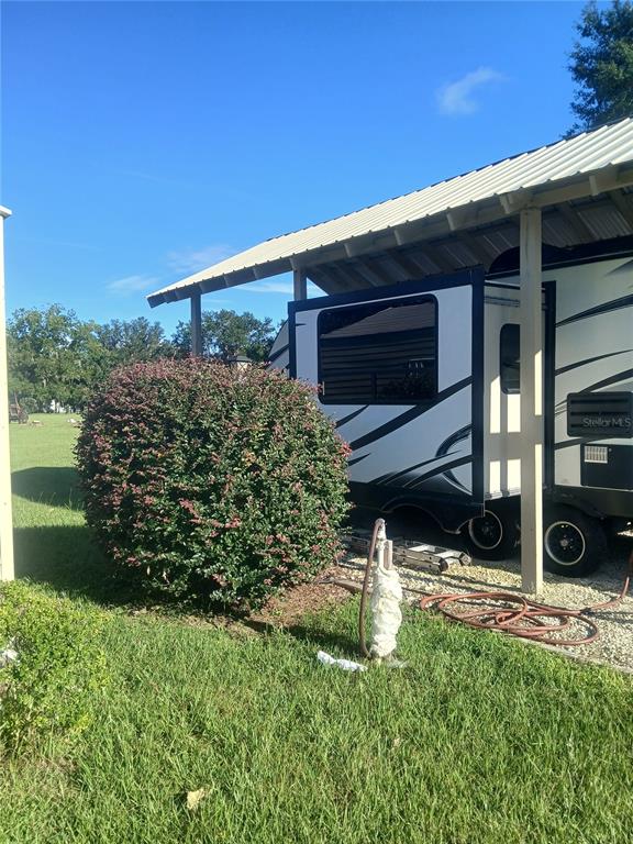 10360 County Road 18 Lake Butler, FL 32054 - Photo 40 of 43 a view of a back yard of the house