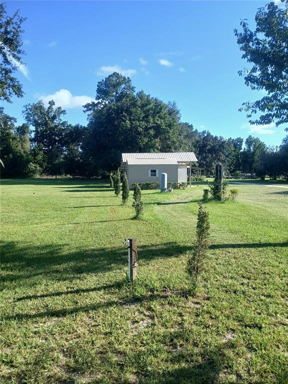 10360 County Road 18 Lake Butler, FL 32054 - Photo 5 of 43 a view of a house with a yard