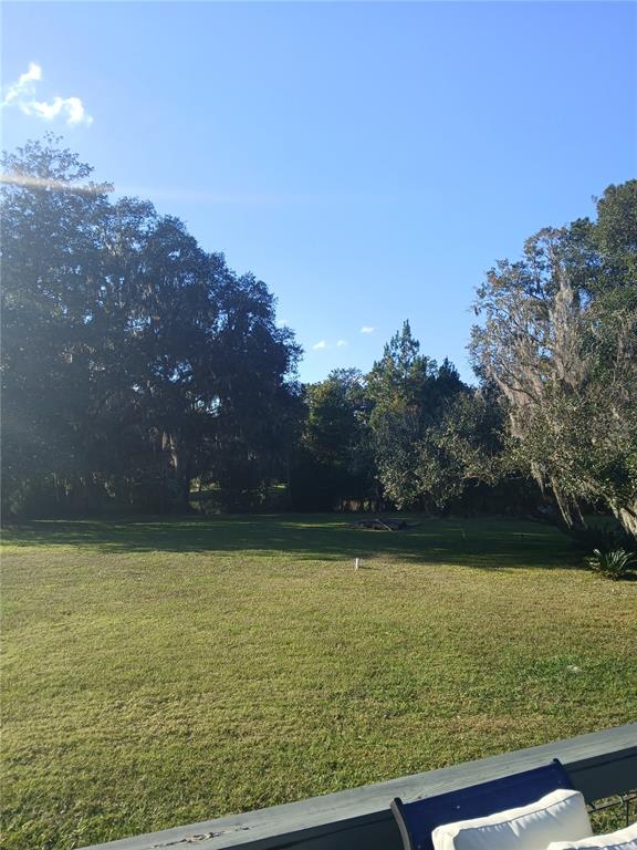 10360 County Road 18 Lake Butler, FL 32054 - Photo 7 of 43 a view of a swimming pool and an outdoor space