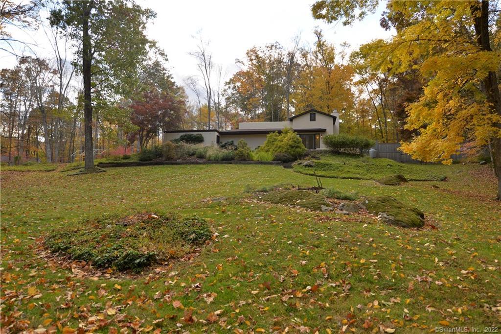 2 Cove Road Brookfield, CT 06804 - Photo 1 of 1 a front view of a house with a yard