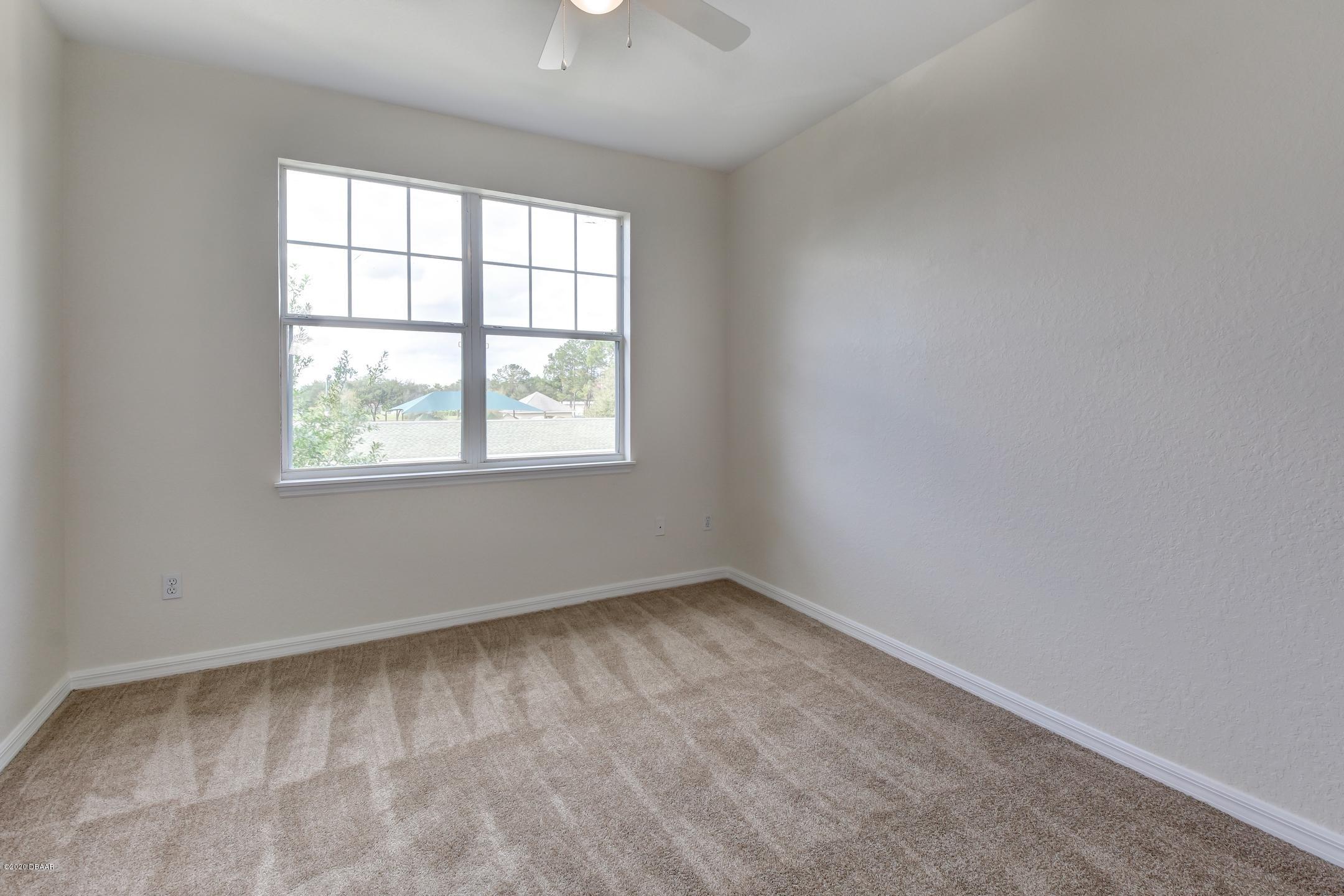 830 Airport Road, Unit 410 Port Orange, FL 32128 - Photo 13 of 26 17-Bedroom 3
