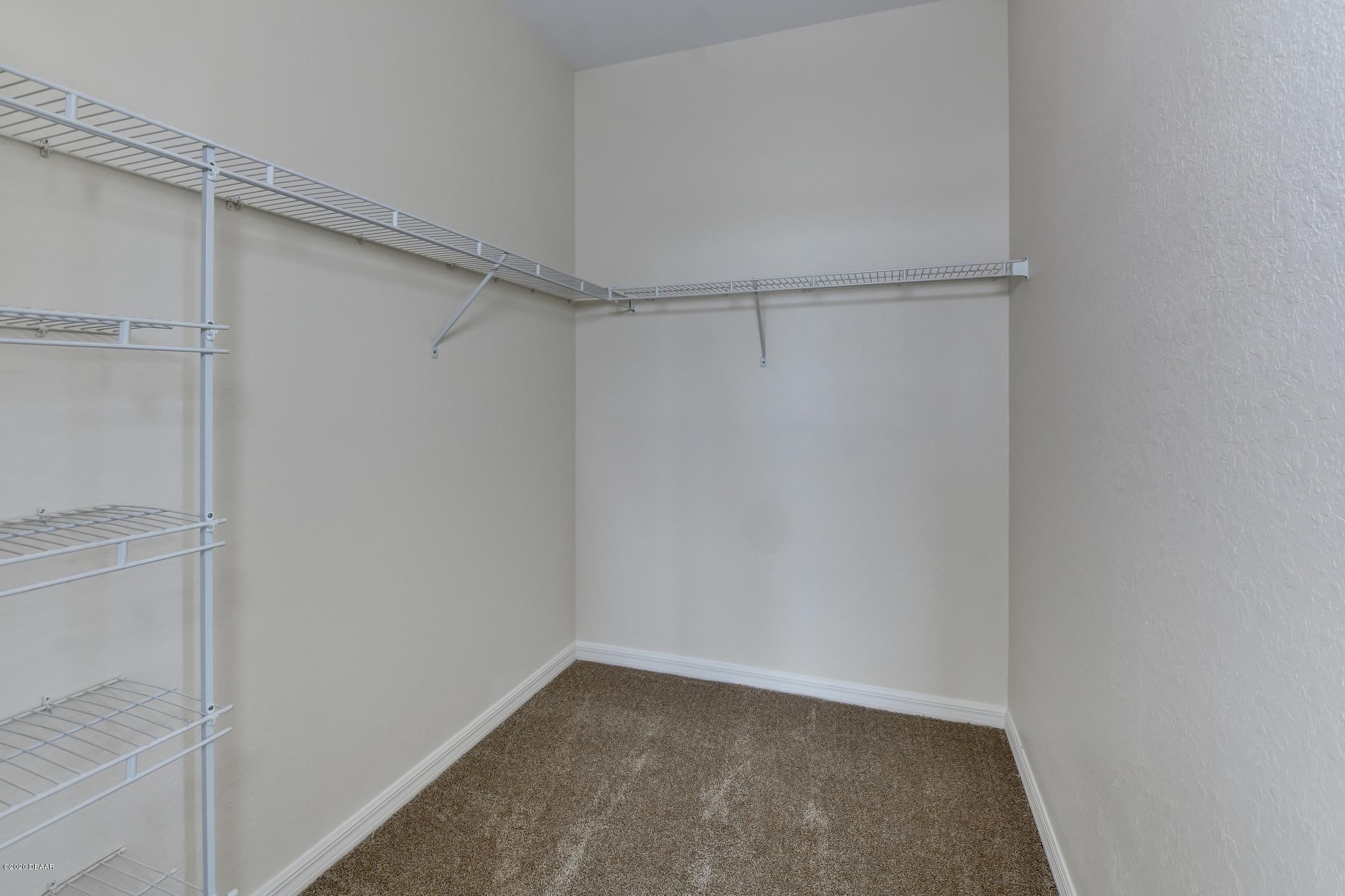 830 Airport Road, Unit 410 Port Orange, FL 32128 - Photo 14 of 26 19-Bedroom 3 Closet