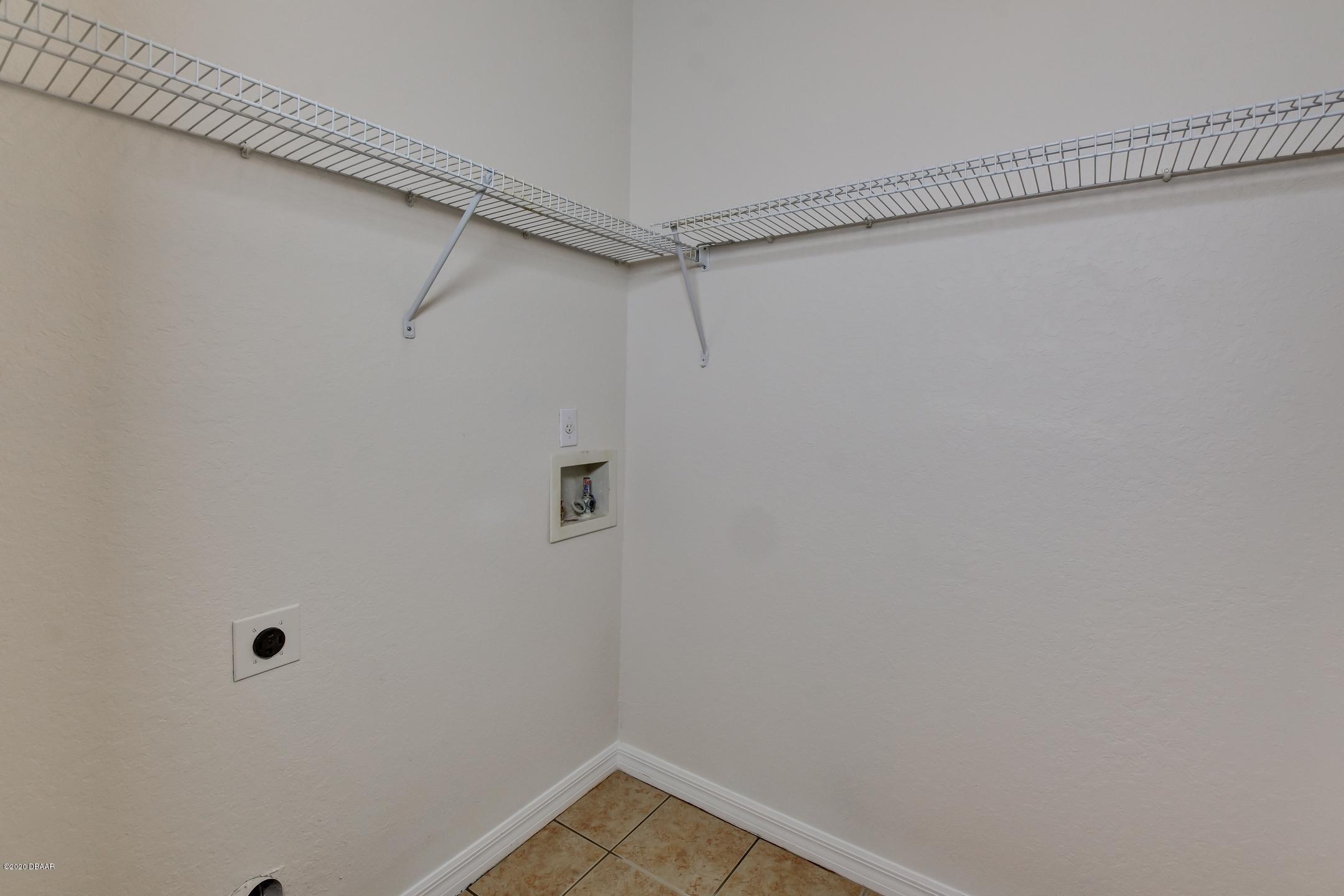 830 Airport Road, Unit 410 Port Orange, FL 32128 - Photo 15 of 26 20-Laundry Room