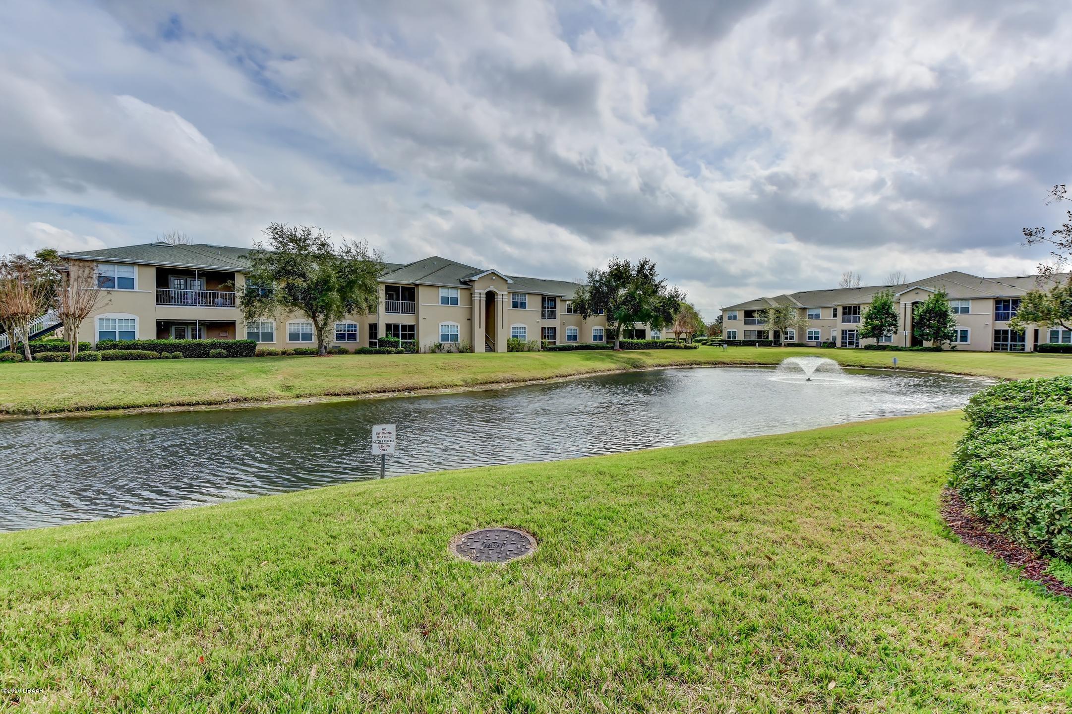 830 Airport Road, Unit 410 Port Orange, FL 32128 - Photo 19 of 26 26-Lake Behind Condo