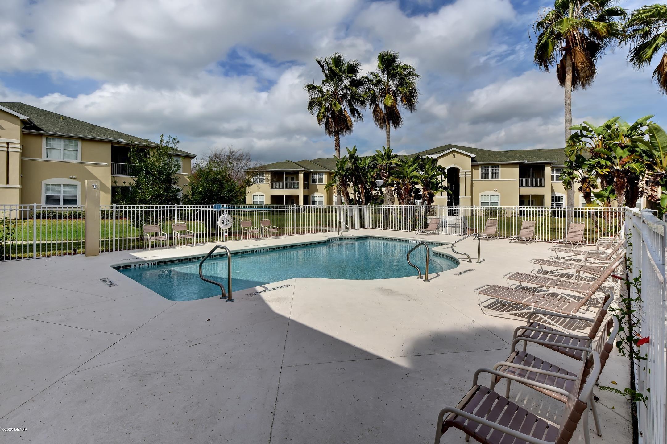 830 Airport Road, Unit 410 Port Orange, FL 32128 - Photo 24 of 26 36-Community Pool