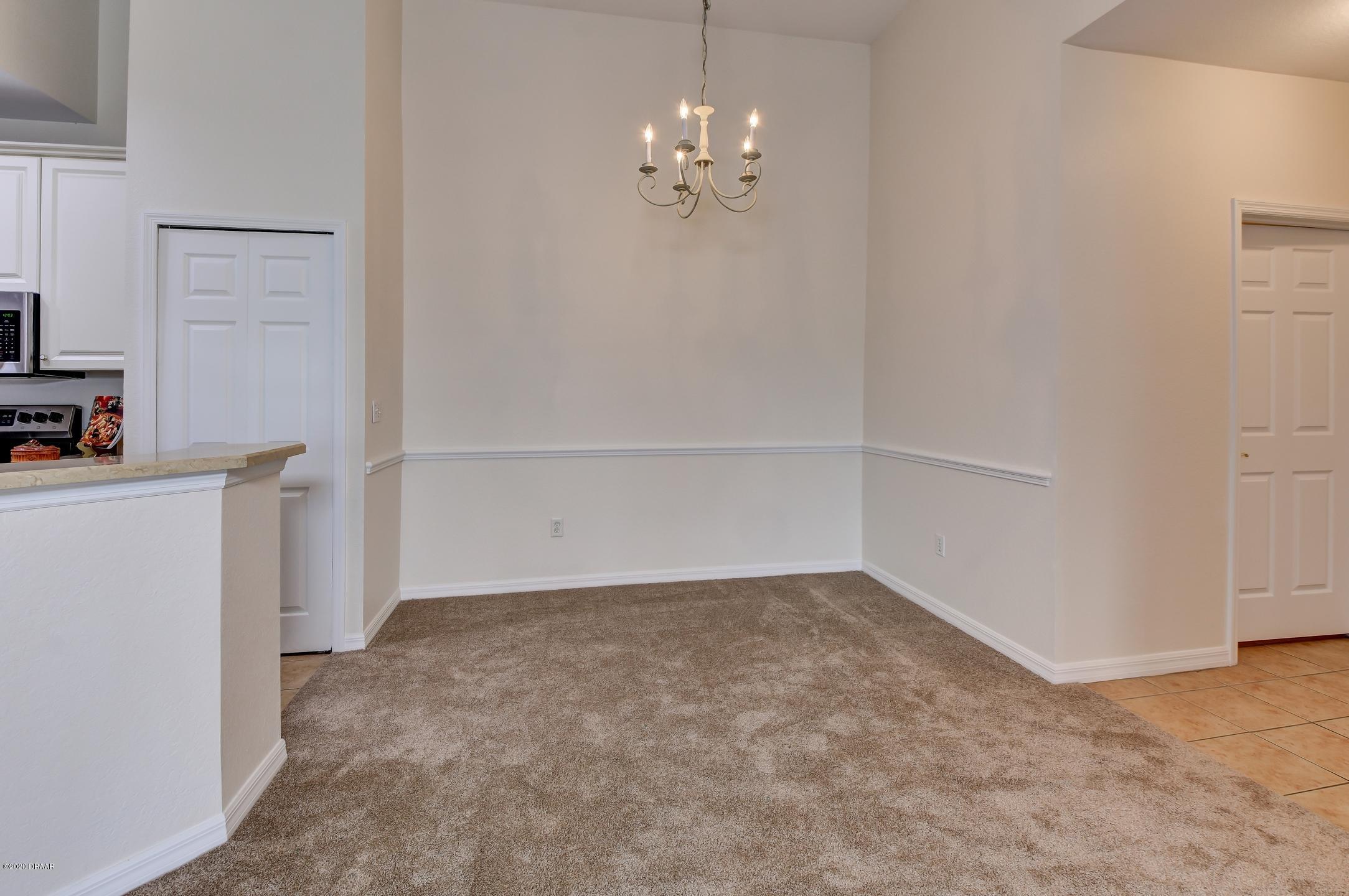 830 Airport Road, Unit 410 Port Orange, FL 32128 - Photo 5 of 26 5-Dining Area