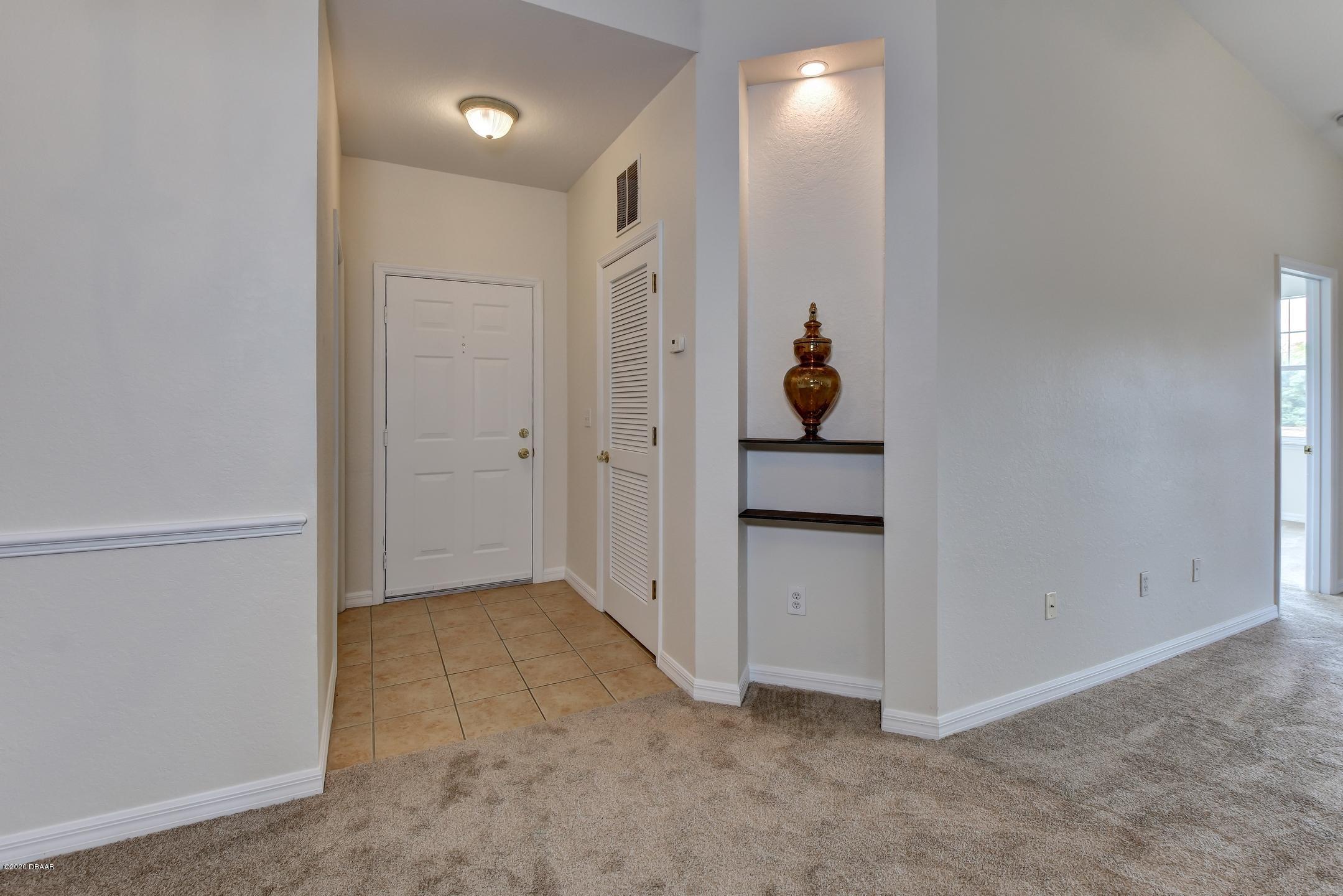 830 Airport Road, Unit 410 Port Orange, FL 32128 - Photo 6 of 26 6-Foyer Entrance