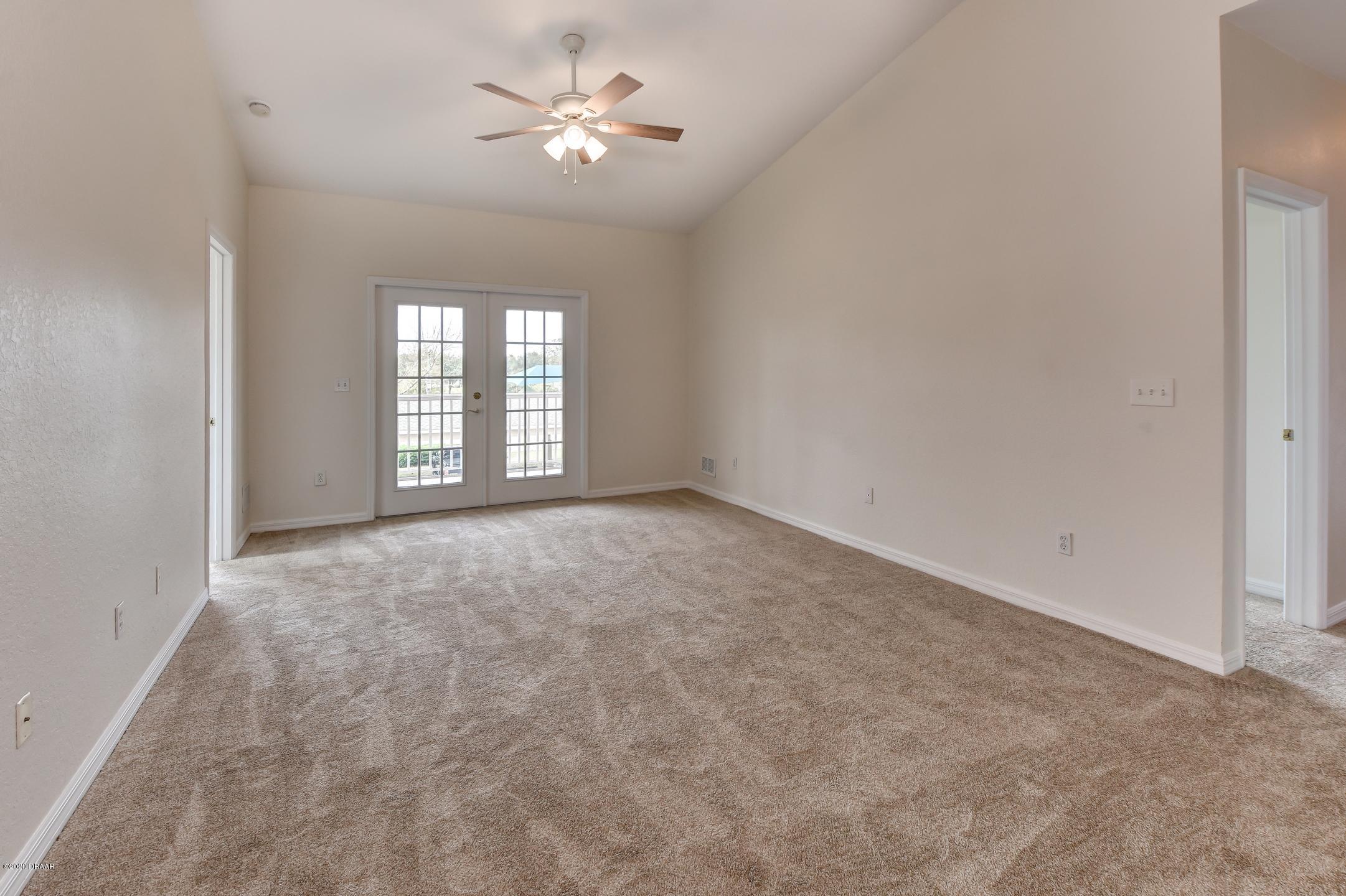 830 Airport Road, Unit 410 Port Orange, FL 32128 - Photo 10 of 26 2-Living Room