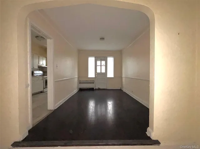 a view of an empty room and window