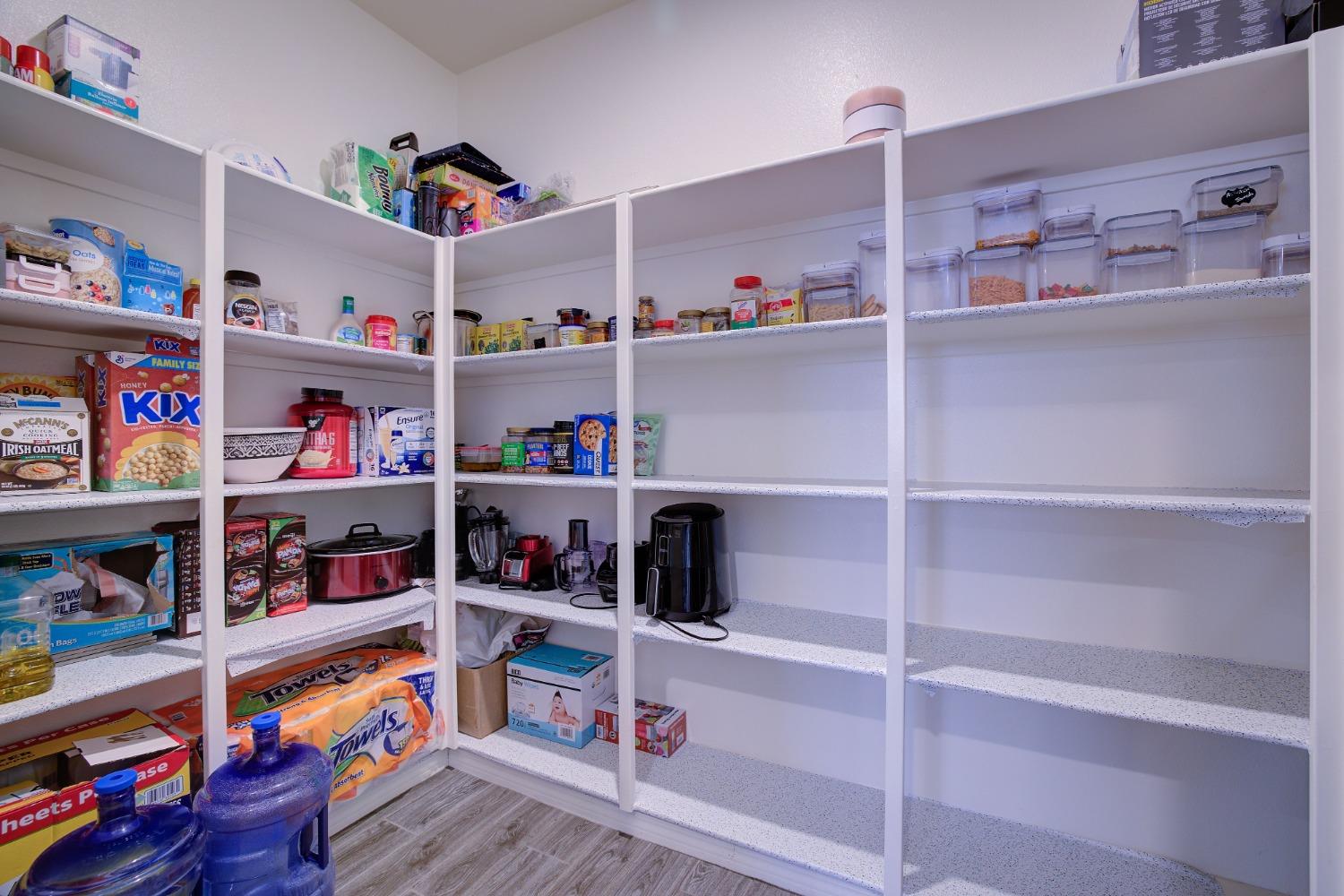 26055 Plumcot Drive Corona, CA 92883 - Photo 31 of 47 a room with storage and utility room