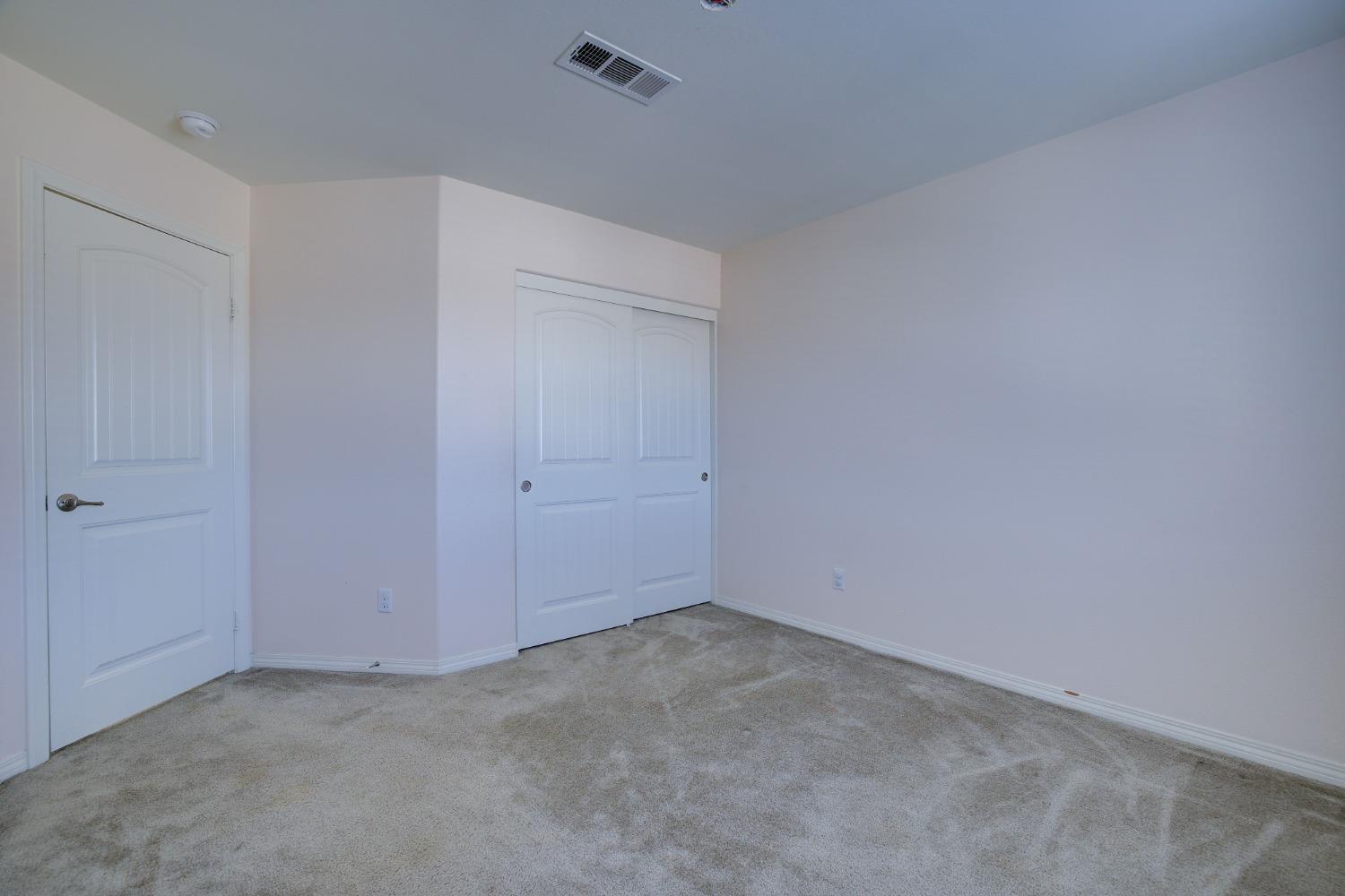26055 Plumcot Drive Corona, CA 92883 - Photo 38 of 47 an empty room with an empty space