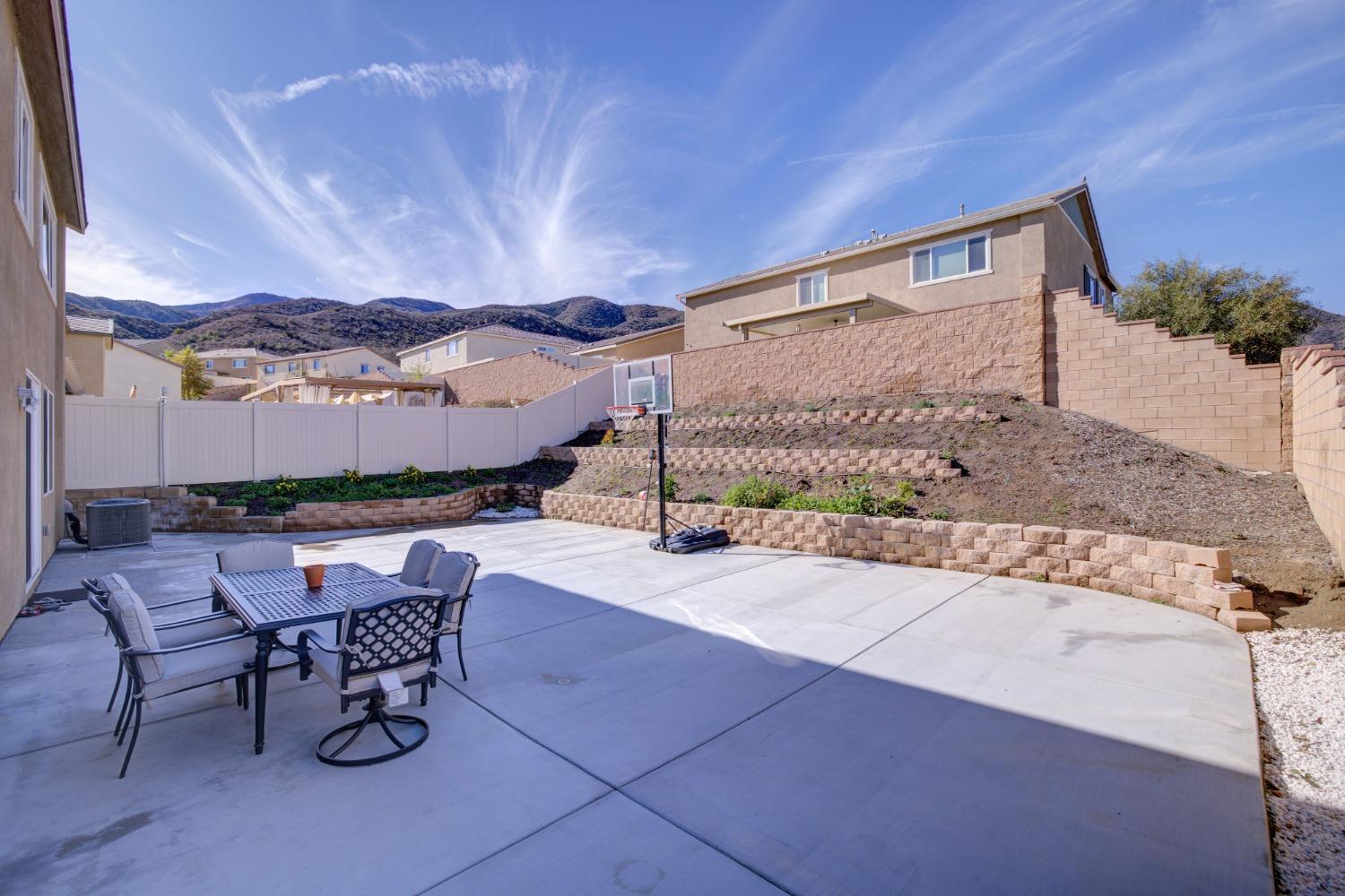 26055 Plumcot Drive Corona, CA 92883 - Photo 45 of 47 a outdoor space with lots of table and chairs