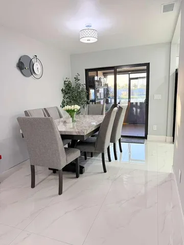 a view of a livingroom with furniture and window
