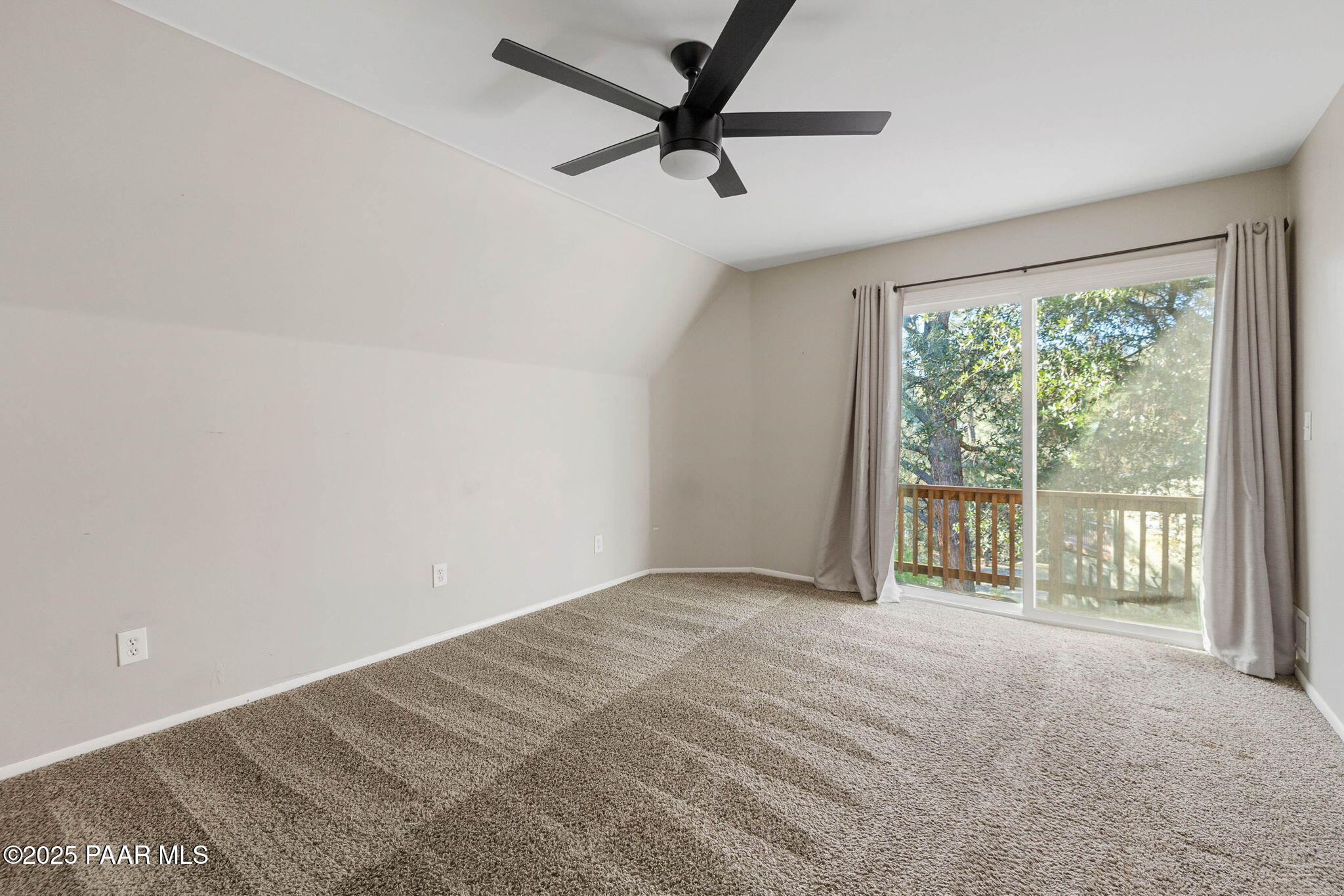 2079 Redwood Way Prescott, AZ 86303 - Photo 13 of 21 a view of a livingroom with a ceiling fan and window