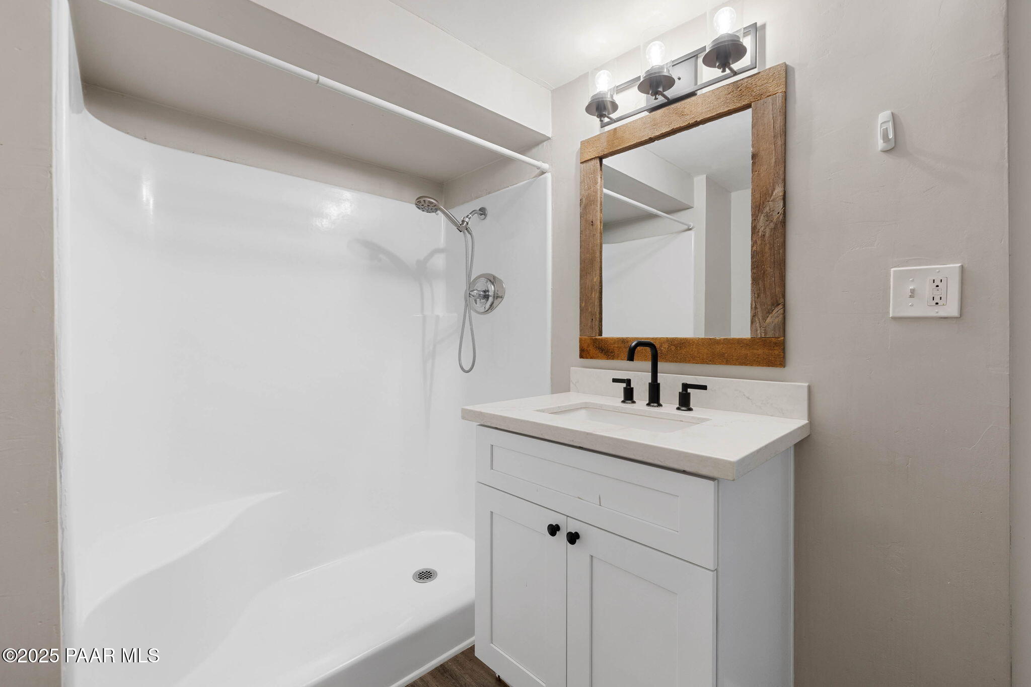 2079 Redwood Way Prescott, AZ 86303 - Photo 17 of 21 a bathroom with a sink and a mirror