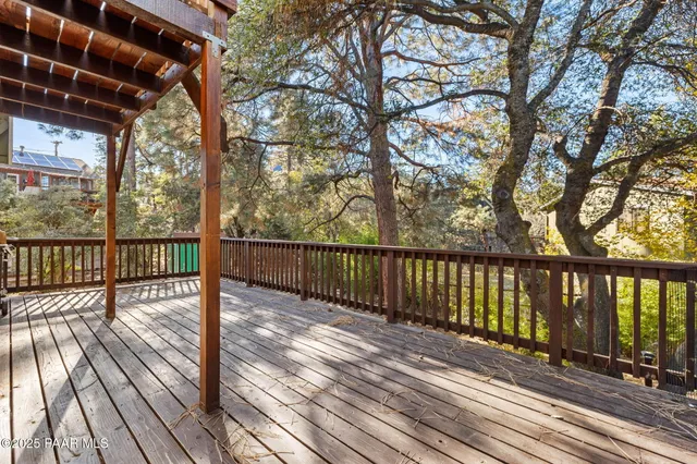 a view of balcony with wooden floor