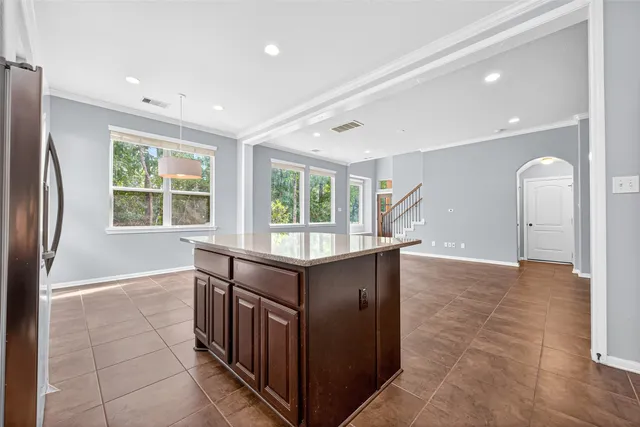a view of kitchen with furniture and window