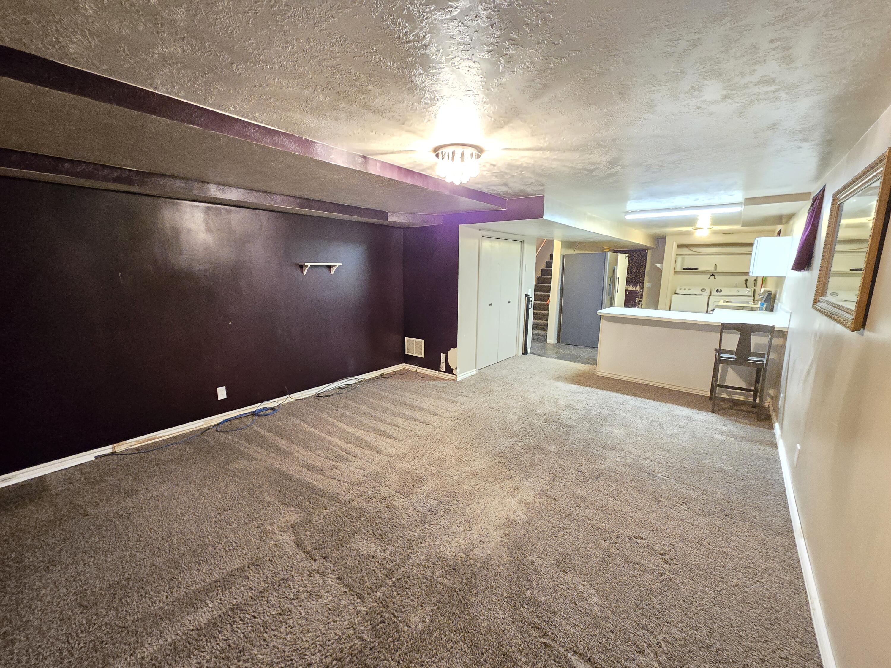 3414 Fowler Avenue Ogden, UT 84403 - Photo 23 of 39 Living Room down 3