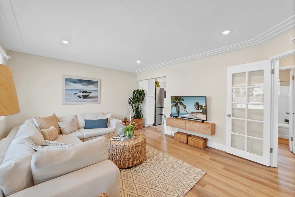 130 Hainline Road Aptos, CA 95003 - Photo 11 of 28 a living room with furniture and wooden floor