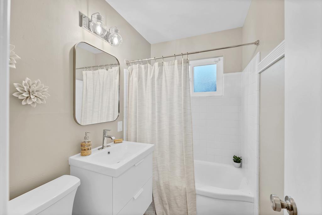 130 Hainline Road Aptos, CA 95003 - Photo 19 of 28 a bathroom with a sink a toilet and shower