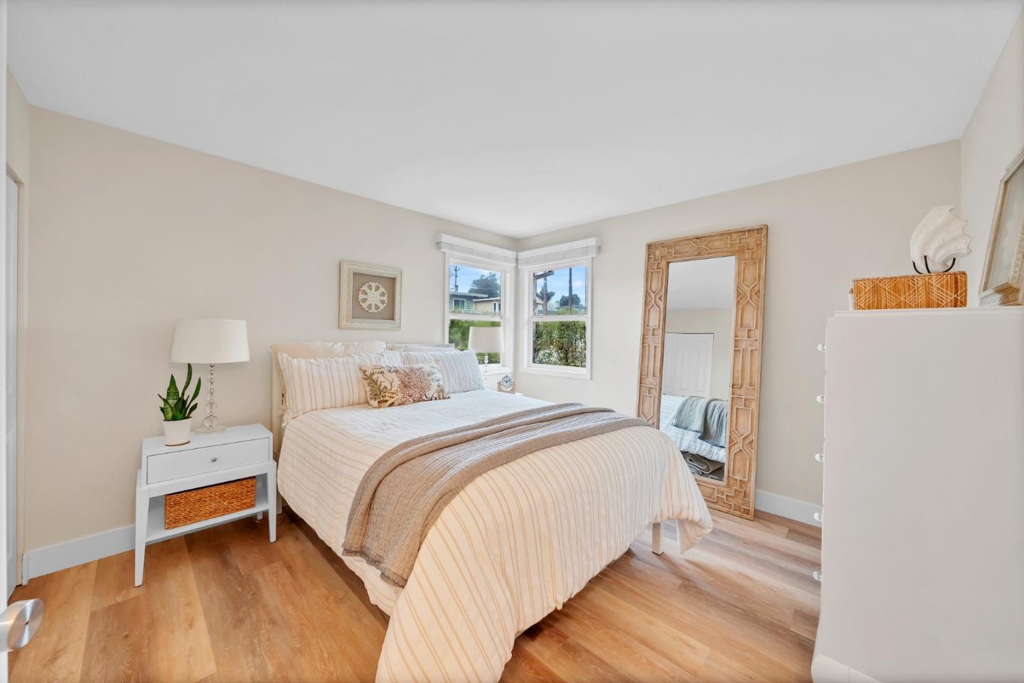 130 Hainline Road Aptos, CA 95003 - Photo 20 of 28 a bedroom with a bed and a potted plant