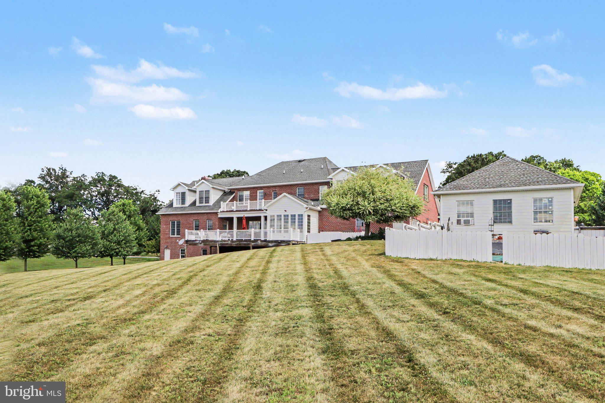 1080 Swatara Road Hershey, PA 17033 - Photo 48 of 59 a front view of a house with a yard