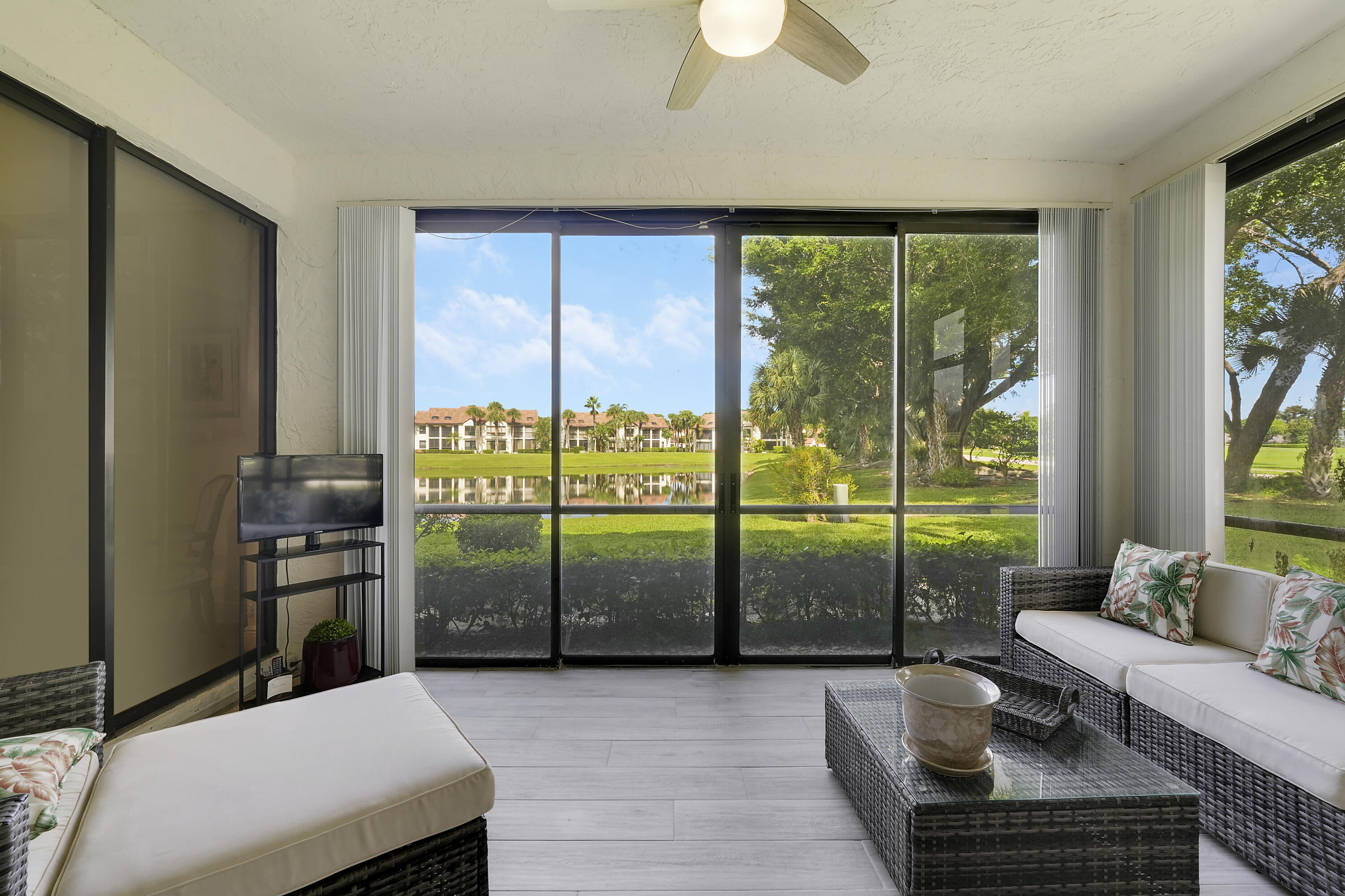 7860 Seville Place, Unit 2203 Boca Raton, FL 33433 - Photo 26 of 43 a living room with furniture