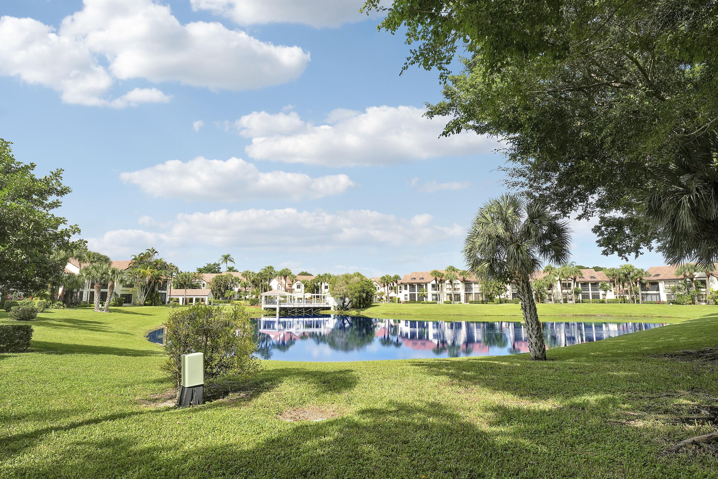 7860 Seville Place, Unit 2203 Boca Raton, FL 33433 - Photo 32 of 43 a view of a park with swings and slides